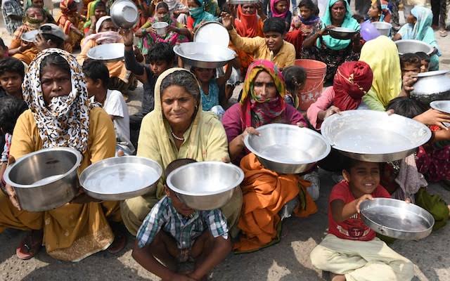 India food crisis India food crisis hunger poor people empty plates waiting f